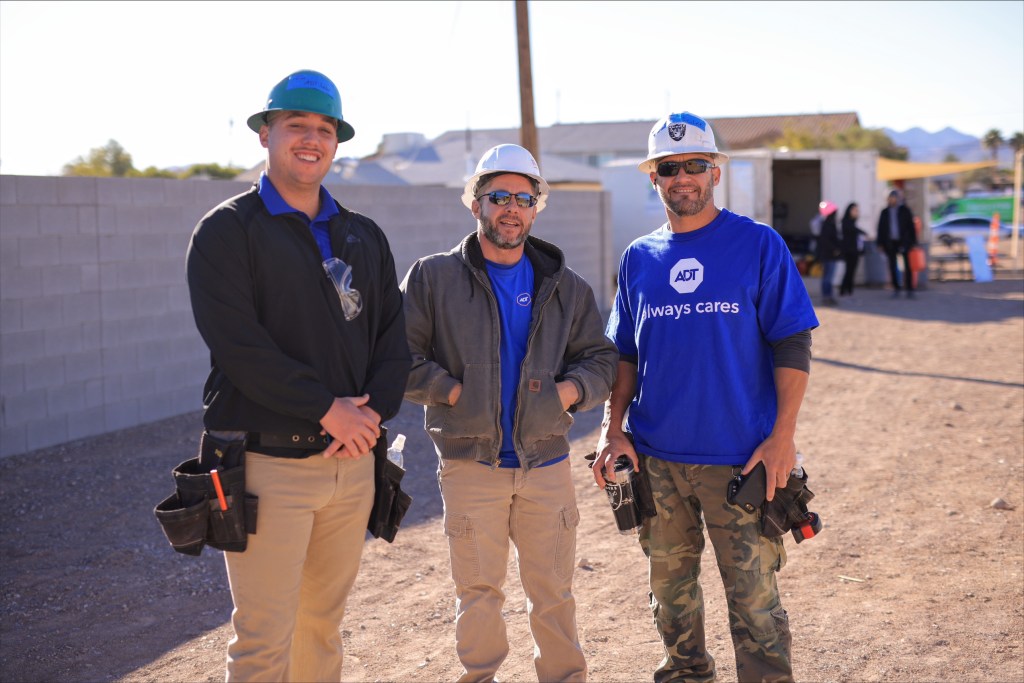 A group of ADT volunteers, including several military veterans, spent the day before Veterans Day on a new Habitat for Humanity project near Las Vegas.