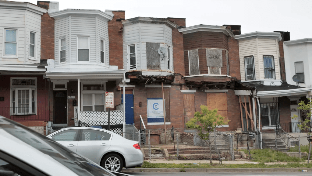 The Carver House (center) is being renovated by Carver Vo-Tech students with the support of Requity and ADT.