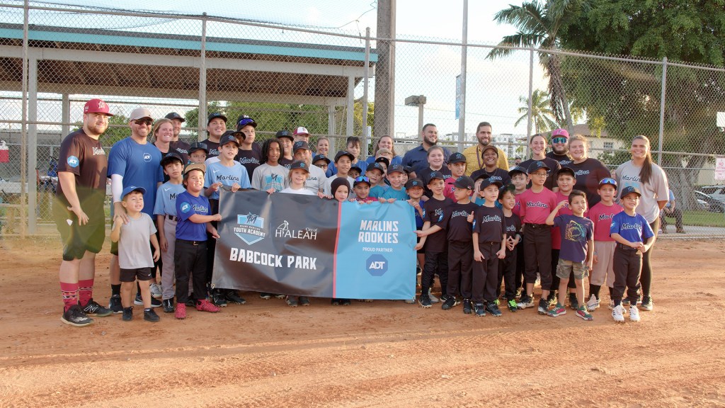 ADT employees volunteered at a baseball and softball clinic in October with the Miami Marlins Youth Academy.