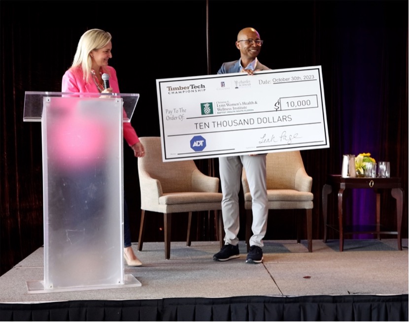 ADT's Leah Page and DeLu Jackson presented a check for $10,000 to the Christine E. Lynn Women’s Health & Wellness Institute the Women’s Day Brunch presented by ADT on Oct. 30.